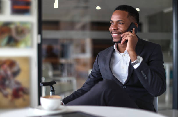 istock African business man checking in to a hotel. 1156778298
