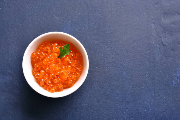 istock Red caviar in bowl 1156780216