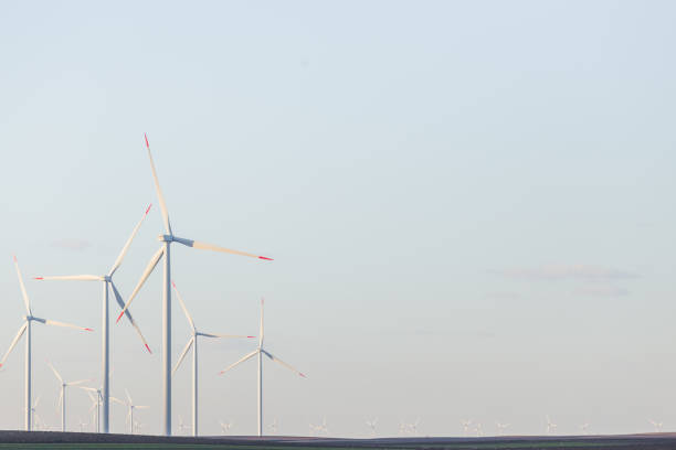 Wind warm on agricultural ground with clear blue sky in background