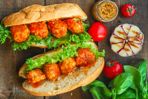 istock meatballs sandwich (snack with meat and vegetables). food background. top view. copy space 1156785736