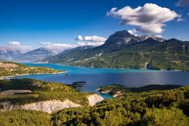 France, Hautes-Alpes (05), Baie-Saint-Michel. Serre-Poncon Lake and Grand Morgon peak in Summer. Durance Valley, European Alps, Provence-Alpes-Cote d'Azur (PACA)