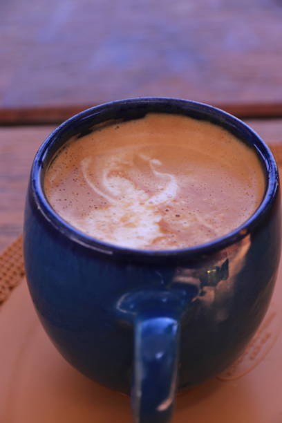 istock A cup of cappuccino on table 1156793934