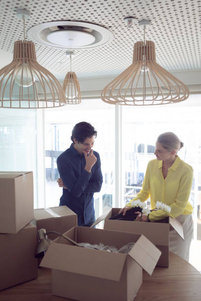 istock Male and female office executives interacting with each other 1156795338