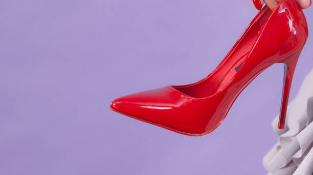 istock Fashion stylist presenting high heels 1156796513