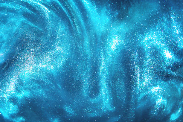 istock Abstract blue glitter shimmering magic underwater space bokeh background 1156800935