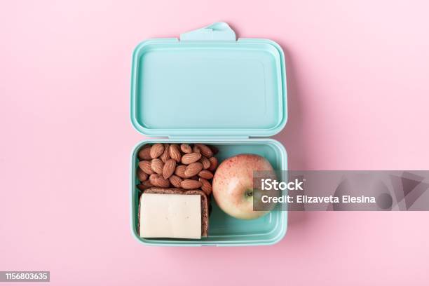 Lunch Box With Apple Sandwich And Almond On Pink Background Back To School Concept With Copy Space For Text Stock Photo - Download Image Now