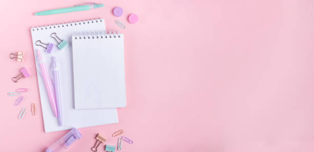 istock School background with notebooks and pastel colorful study accessories on pink background Back to school concept 1156803638