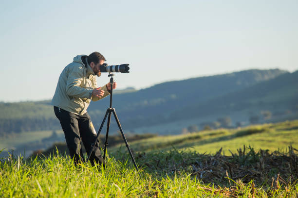 istock Photografer with tripod 1156815025