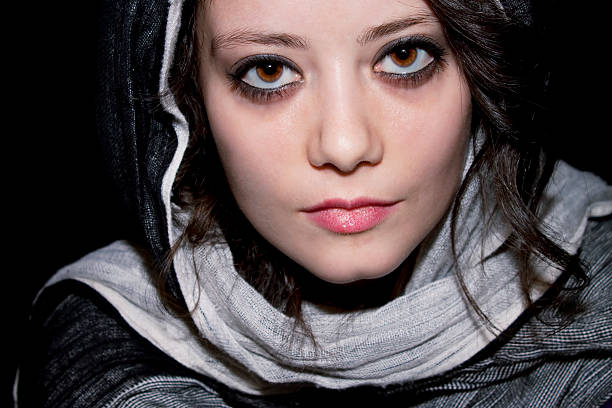 istock woman wearing Headscarf and looking 115681695