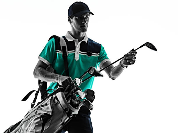 istock Man Golf golfer golfing isolated shadow silhouette white background 1156821538