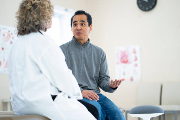 istock Latino patient talking to the doctor 1156822519