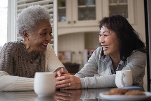 istock Two Female Seniors Relaxing Together 1156822660
