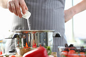 Culinary Chef Adding Saucepan White Sea Salt