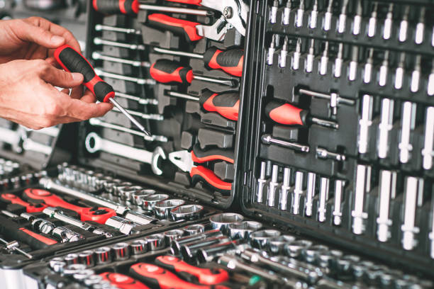 istock hardware showcase repairman choosing screwdriver 1156822983