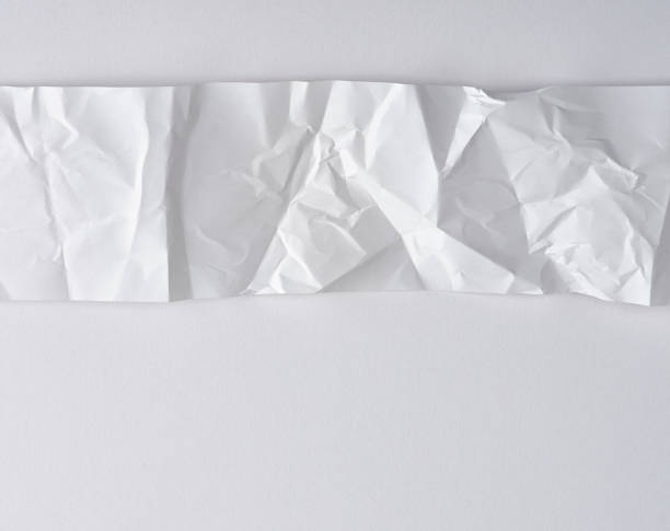 istock white strip of paper on a white background, copy space 1156828584