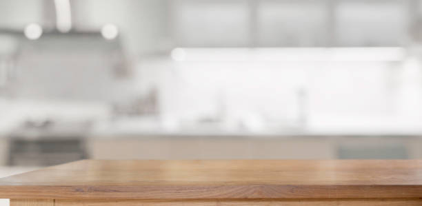 istock Wood table in kitchen room for products display montage 1156829853