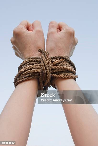 Tied With Rope Hands Stock Photo - Download Image Now - Tied Up, Slavery, Tied Knot