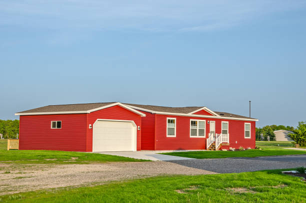 Bright Red Sunlit Manufactured Home New manufactured home with vinyl siding and trim in a new community manufactured housing stock pictures, royalty-free photos & images