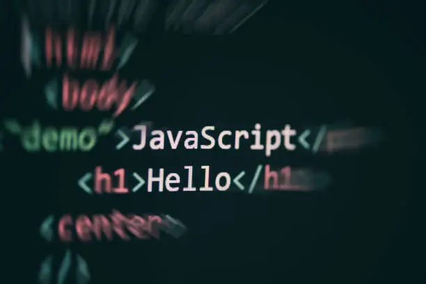 Photo of Javascript code computer language programming internet text editor components  display screen