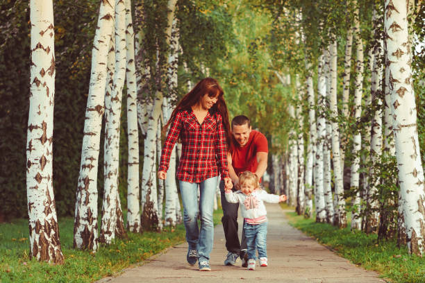 istock family with children in birch grove 1156840013