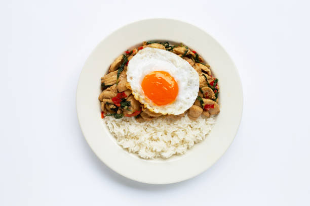 istock Rice topped with stir-fried chicken and holy basil, fried egg 1156843469