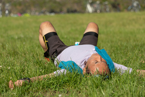 Senior man resting after sports race