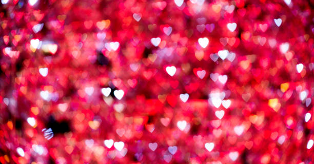 バレンタインデーの背景のための抽象的な赤い心 - conceptual symbol flash ストックフォトと画像