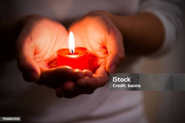 Woman Hands Holding Burning Heartshaped Candle Stock Photo - Download Image Now - Candle, Lighting Equipment, Heart Shape