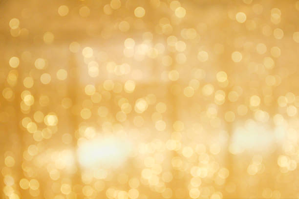 istock Gold bokeh sparkle glitter abstract patterns for Christmas and Happy new year background 1156846720