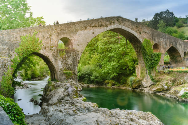 istock Cangas de Onis Bridge, Asturias Spain 1156853095
