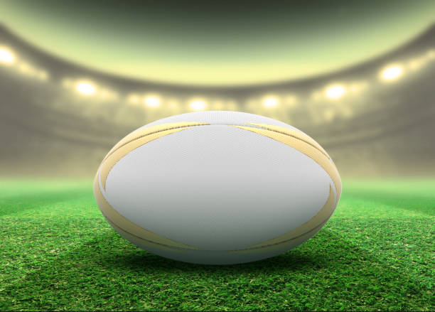 istock Floodlit Stadium And Rugby Ball 1156854855