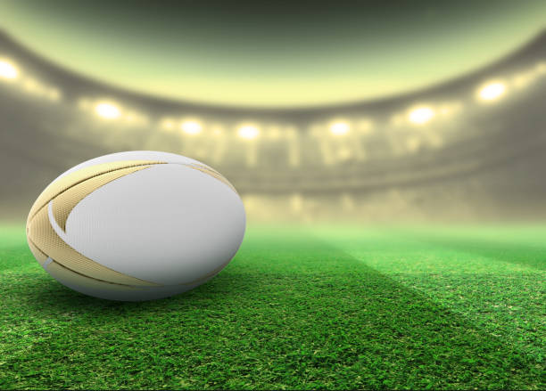 istock Floodlit Stadium And Rugby Ball 1156855132