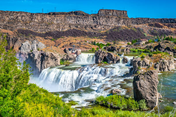 맑은 하늘과 트윈 폴스에서 쇼숀 폭포를 통해 더블 무지개와 아름다운 아침, 아이다호 - shoshone falls 뉴스 사진 이미지