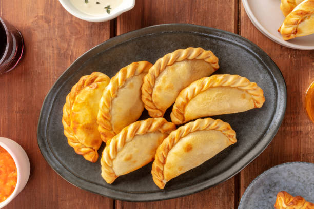 istock A closeup overhead shot of empanadas on a platter 1156861502