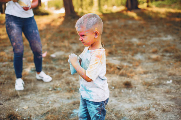 istock Mother with son playing in a summer park 1156861570