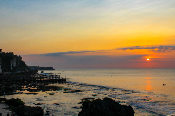 istock Sunset in Jimbaran, Bali, Indonesia 1156862575