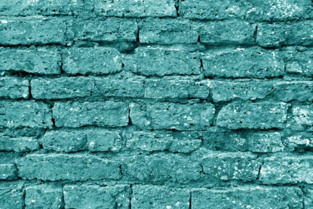 istock Old grungy brick wall texture in cyan tone. 1156863868