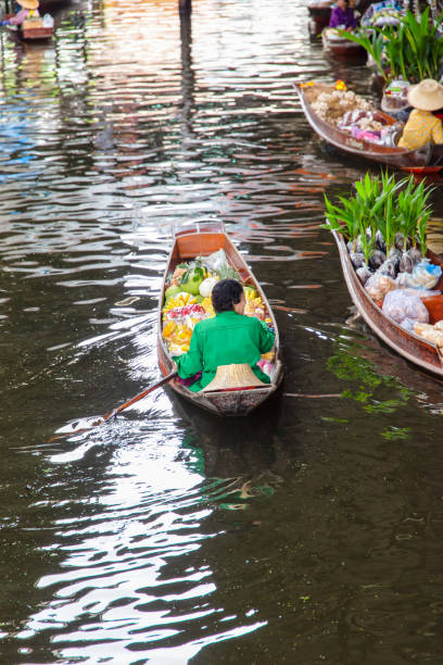 istock Damnoen Saduak Floating Market 1156864029