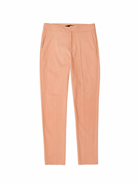 istock Women's pants peach color isolated on white background 1156866994