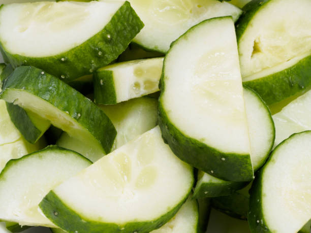 istock Sliced cucumber. Macro photo 1156867991