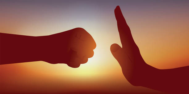 istock Gesture symbolizing attack and defense with a punch and a protected hand to stop it. 1156868201