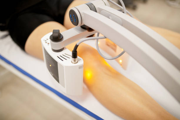 istock Knee therapy with electromagnetic radiation instrument 1156868264