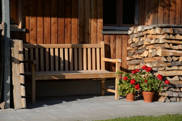 istock Bench at a wooden house 1156868659