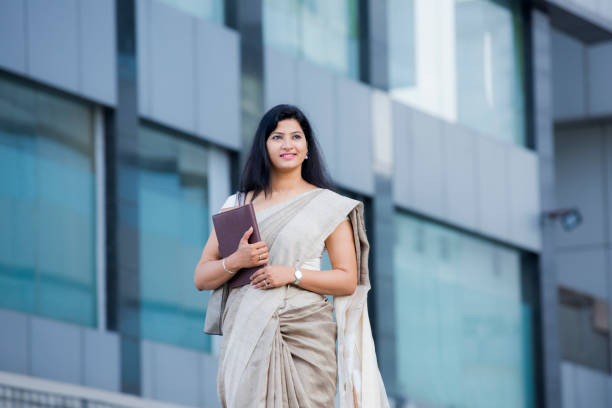 Businesswoman - stock images Indian, women, corporate, office, working, lifestyle sari stock pictures, royalty-free photos & images