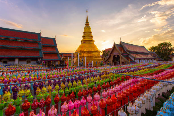 colorful lamp festival and lantern in loi krathong at wat phra that hariphunchai - wat phra sing photos et images de collection