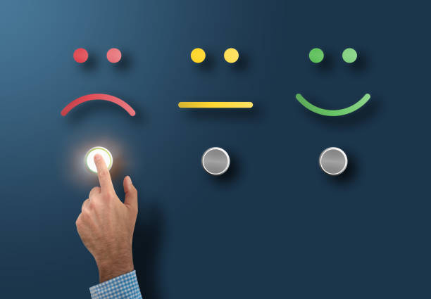 service rating and survey concept with dissatisfied customer touching interface button with sad face stock photo