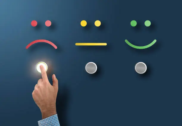 Photo of service rating and survey concept with dissatisfied customer touching interface button with sad face