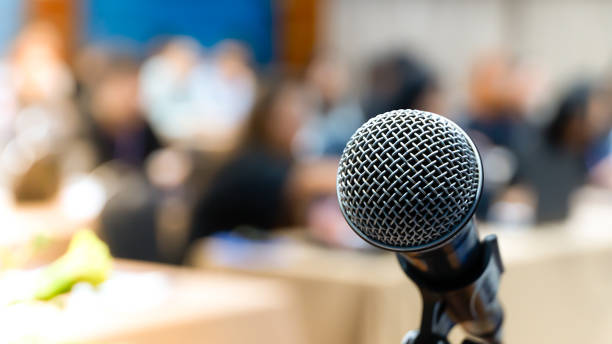 istock Microphone on stage for opening ceremony and performances. Blurring the movie scene 1156880394
