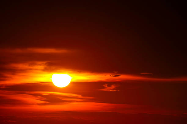 istock sunset on ocean last light red and orange sky silhouette cloud 1156886121