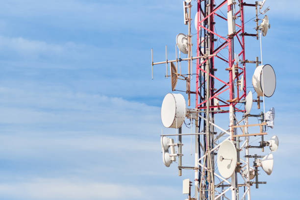 istock Telecommunication antennas with blue sky in the background on a sunny say 1156892659